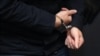 GERMANY -- Stephan Balliet, who is accused of shooting dead two people after an attempt to storm a synagogue in Halle an der Saale, eastern Germany, has his hands cuffed as he arrives into the courtroom 